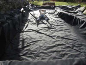 One of the greatest advantages of EPDM rubber is its flexibility. Here a customer shows how readily EPDM liner moulded around the curves of his pond 
