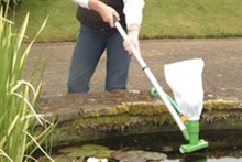 Garden pond maintenance using a pond vac