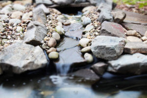 Waterfall flowing into a pond