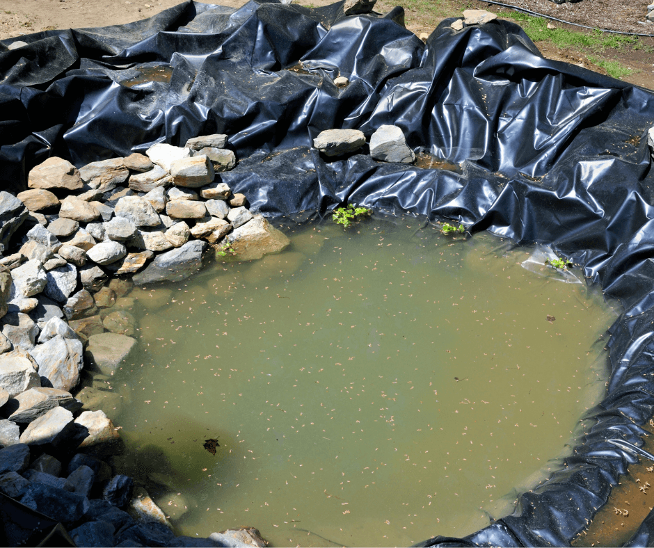 Exposed pond liner needing repair.
Mastic tape is a good way to repair a liner